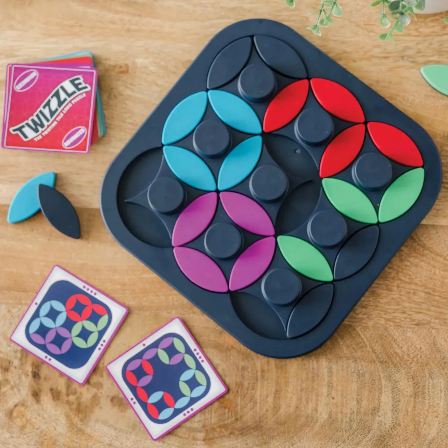 Twizzle Twisting Tile Logic Puzzles